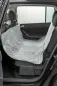 Preview: Graue Autoschondecke mit Pfotenmuster und Elastikgurten gegen Verrutschen